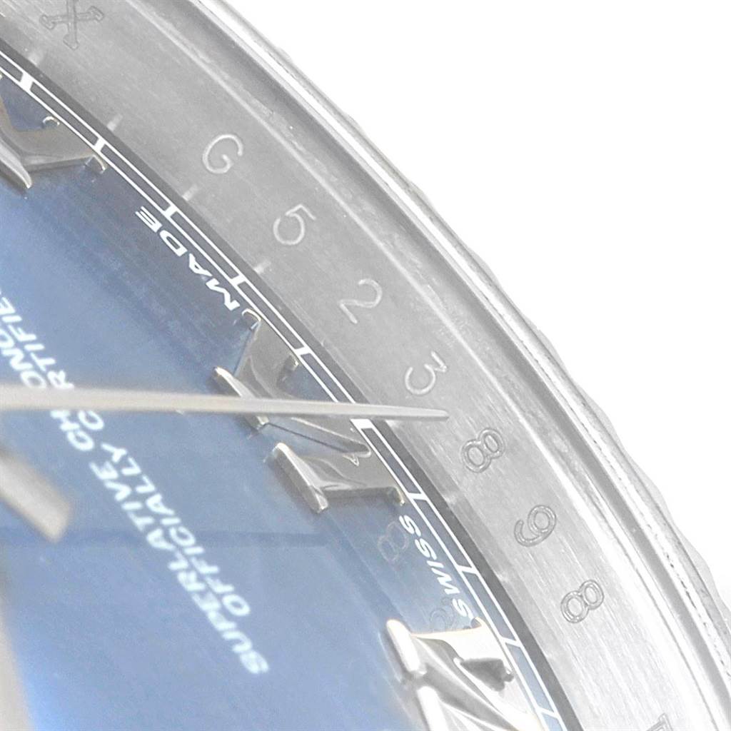 The image shows a close-up angle of the Rolex Datejust 41 116334 Men's Stainless Steel Blue Dial 116334 Men's Stainless Steel Blue Dial, focusing on the dial, hour markers, and part of the bezel.