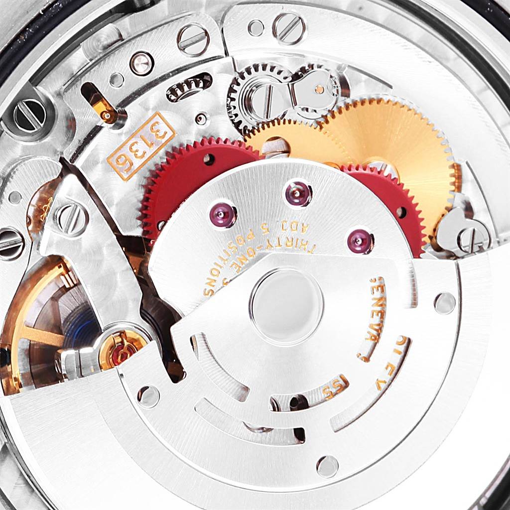 This close-up image shows the intricate inner mechanism of the Rolex Datejust 41 116334 Men's Stainless Steel Blue Dial 116334 Men's Stainless Steel Blue Dial, highlighting gears and the rotor.
