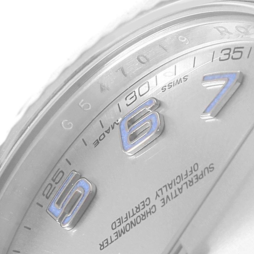 This image shows a close-up view of the dial, specifically numerals 5, 6, and 7 on a Rolex Datejust 41 116334 Men
s Stainless Steel Grey Dial 116334 Men
s Stainless Steel Grey Dial model watch.