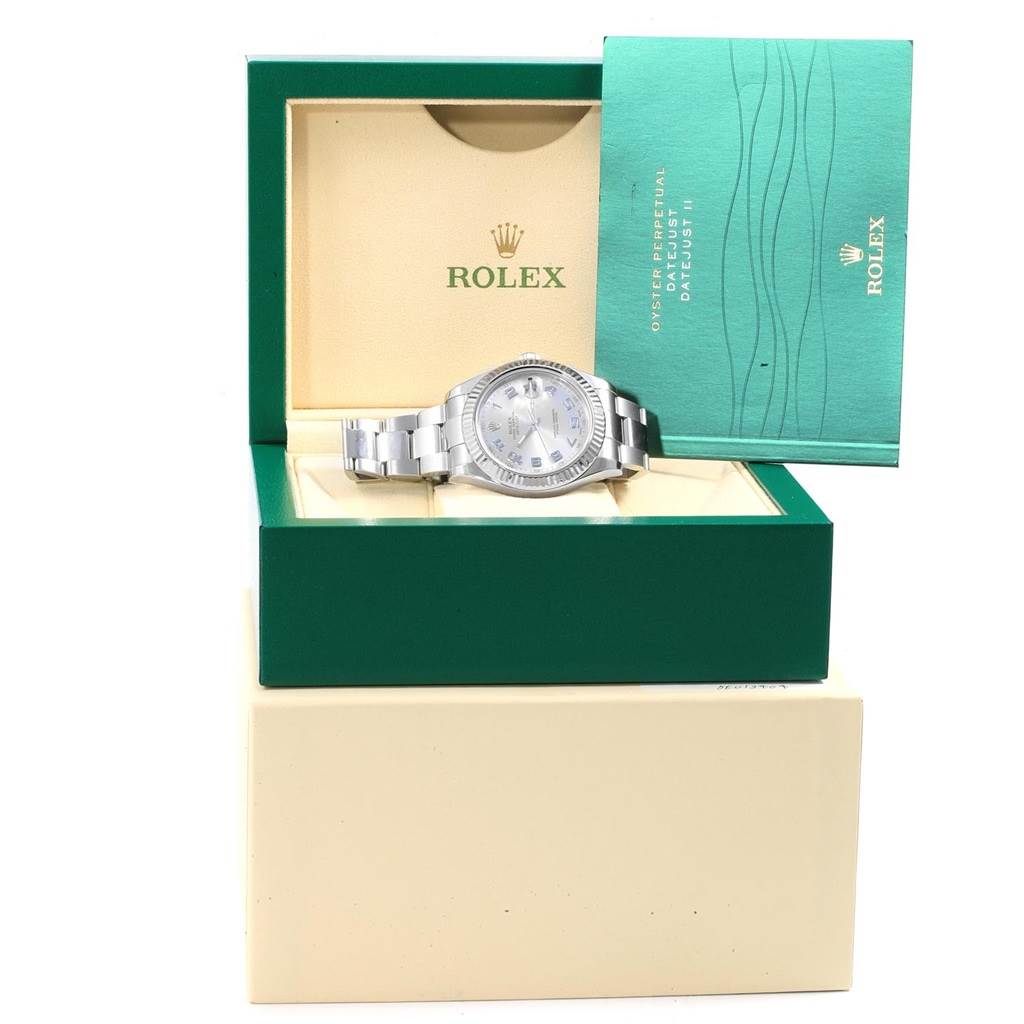 The image shows a Rolex Datejust 41 116334 Men
s Stainless Steel Grey Dial 116334 Men
s Stainless Steel Grey Dial watch at a front angle, displayed in its green box alongside its booklet.