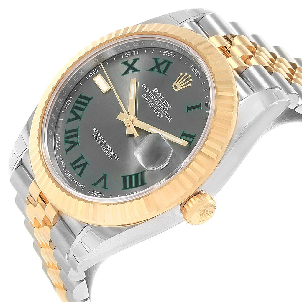 This image shows a Rolex Datejust 41 126333 Men's Steel and Gold (two tone) Grey Dial 126333 Men's Steel and Gold (two tone) Grey Dial watch from a slight angled view, displaying its face, fluted bezel, and two-tone bracelet.