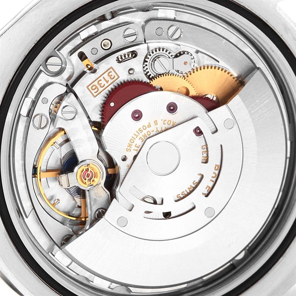 The image shows the detailed view of the movement mechanism inside the Rolex Datejust 41 116334 Men's Stainless Steel Silver Dial 116334 Men's Stainless Steel Silver Dial watch.