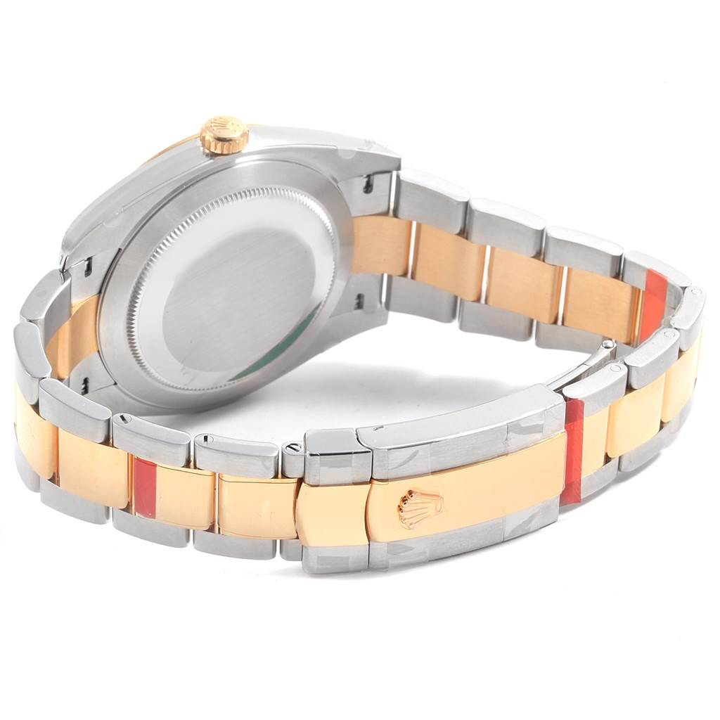 This image shows the back case and bracelet of a Rolex Datejust 41 126303 Men's Steel and Gold (two tone) Black Dial 126303 Men's Steel and Gold (two tone) Black Dial watch at an angle.