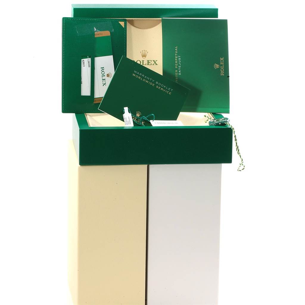 The image shows the packaging and accessories, including booklets and tags, for a Rolex Datejust 41 126333 Men
s Steel and Gold (two tone) Champagne Dial 126333 Men
s Steel and Gold (two tone) Champagne Dial model watch.