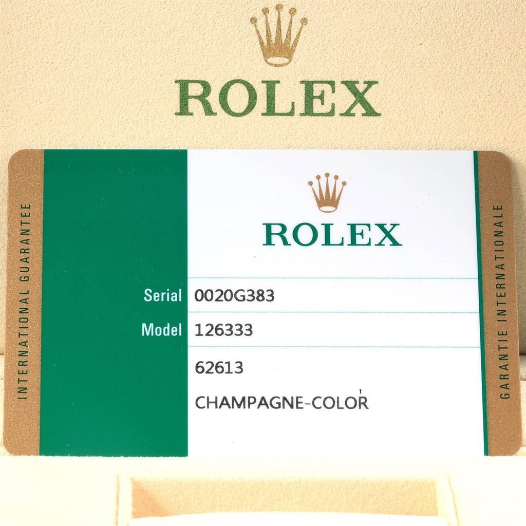 The image shows a serial and model information card for the Rolex Datejust 41 126333 Men
s Steel and Gold (two tone) Champagne Dial 126333 Men
s Steel and Gold (two tone) Champagne Dial watch.