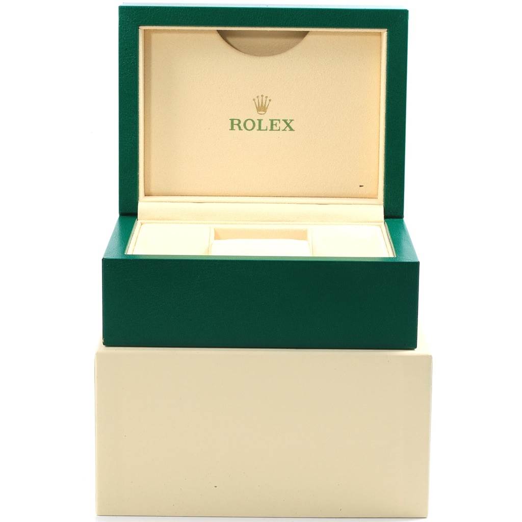 This image shows an open Rolex Datejust 41 116334 Men's Stainless Steel Silver Dial 116334 Men's Stainless Steel Silver Dial box in an upright position with its green exterior and beige interior visible.