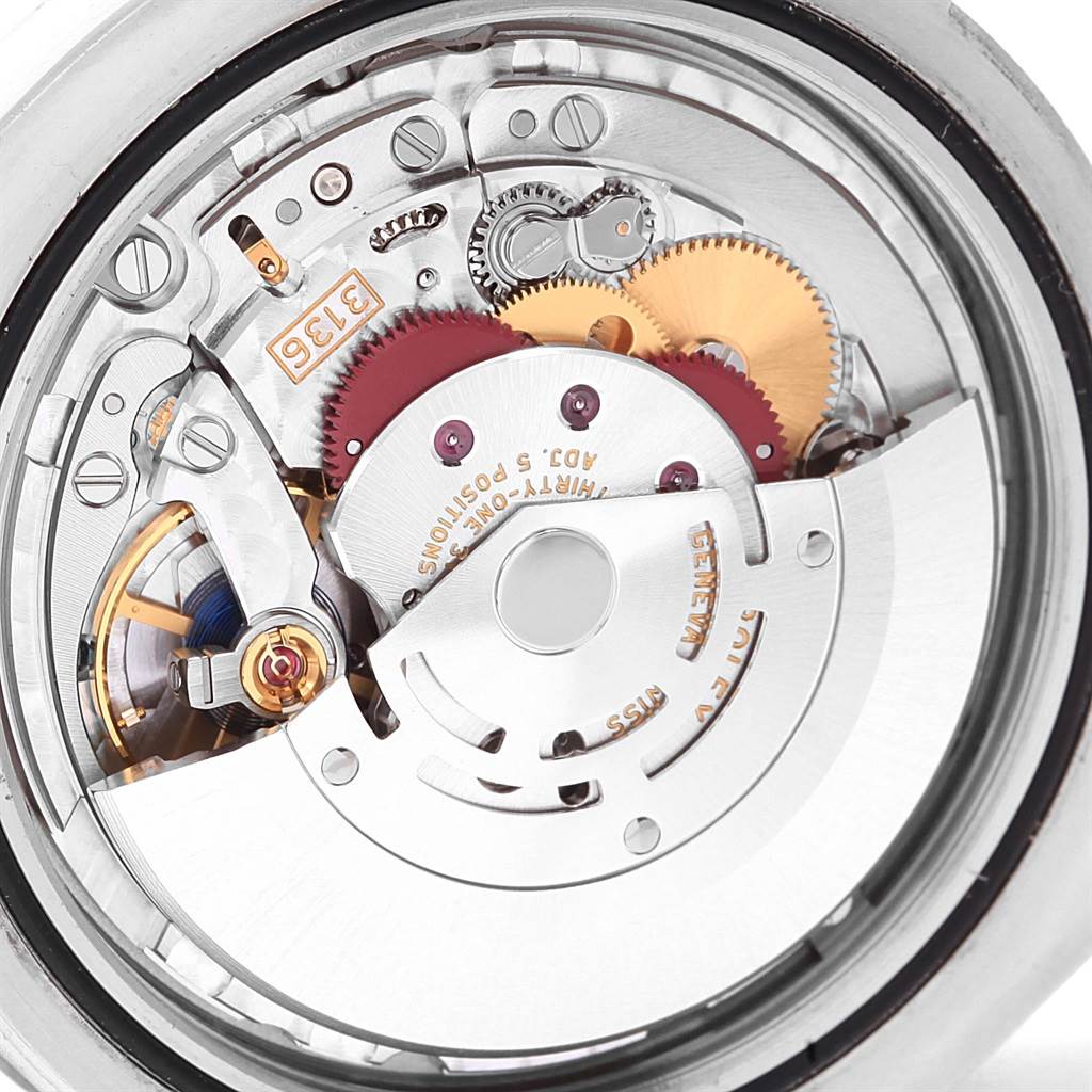 This image shows a detailed close-up of the movement mechanism inside a Rolex Datejust 41 116334 Men's Stainless Steel Silver Dial 116334 Men's Stainless Steel Silver Dial watch.