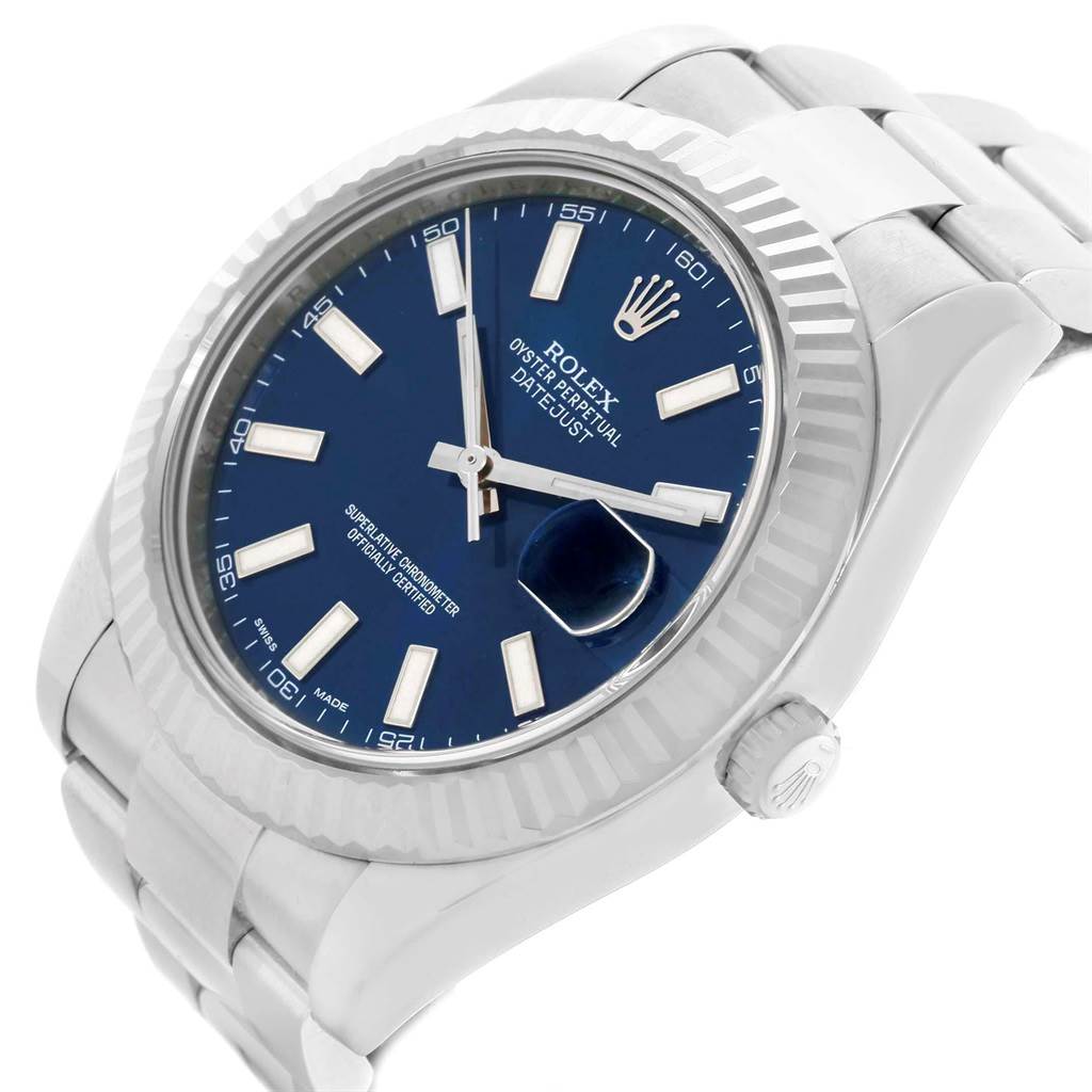 This image of the Rolex Datejust 41 116334 Men's Stainless Steel Blue Dial 116334 Men's Stainless Steel Blue Dial watch shows the dial, fluted bezel, and part of the bracelet at an oblique angle.