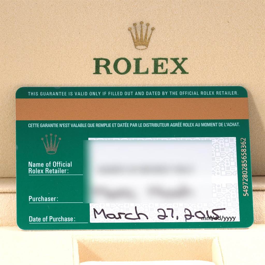 The image shows a warranty card for the Rolex Datejust 41 116334 Men's Stainless Steel Blue Dial 116334 Men's Stainless Steel Blue Dial model, positioned against a beige surface with the Rolex logo visible.