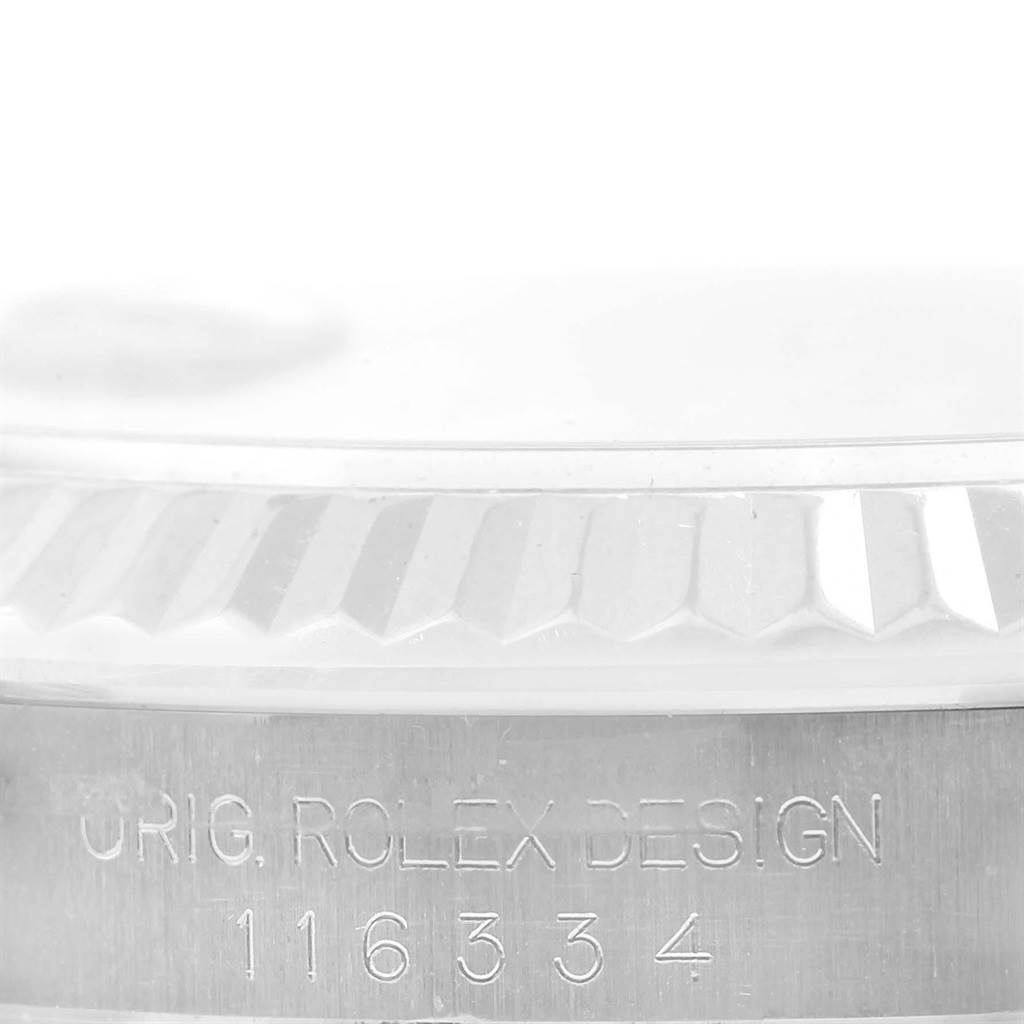 The image shows a close-up of the bezel and the engraved reference number on the side of a Rolex Datejust 41 116334 Men's Stainless Steel Blue Dial 116334 Men's Stainless Steel Blue Dial watch.