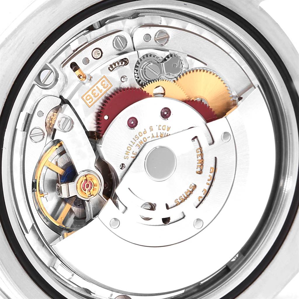 This image shows a close-up view of the movement mechanism of a Rolex Datejust 41 116334 Men's Stainless Steel Blue Dial 116334 Men's Stainless Steel Blue Dial watch.