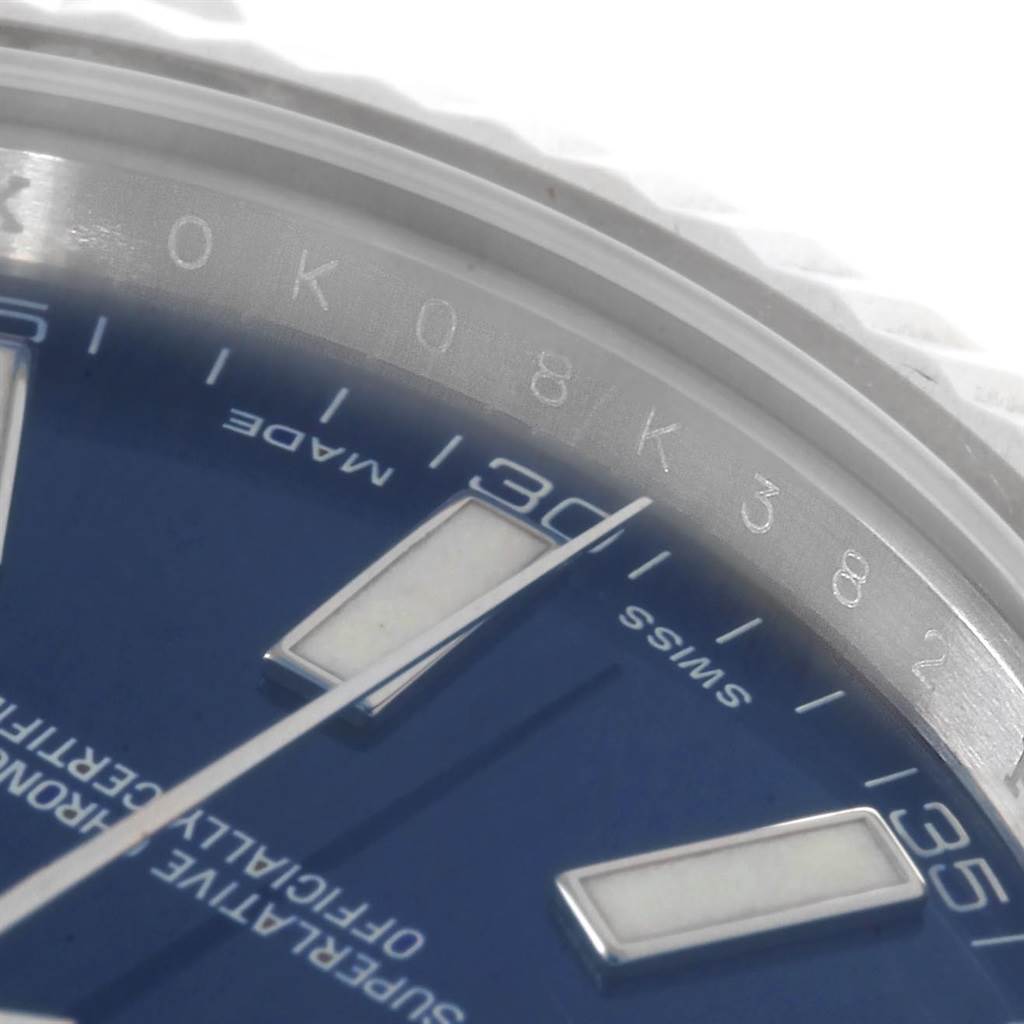 Close-up of the Rolex Datejust 41 116334 Men's Stainless Steel Blue Dial 116334 Men's Stainless Steel Blue Dial showing part of the blue dial, markers, and the edge of the bezel.