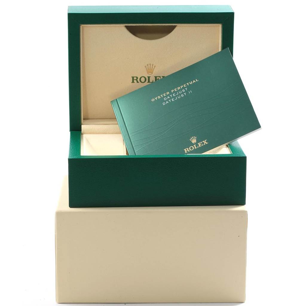 The image shows the packaging and manual for a Rolex Datejust 41 116334 Men's Stainless Steel White Dial 116334 Men's Stainless Steel White Dial, with the box open and the manual placed inside.