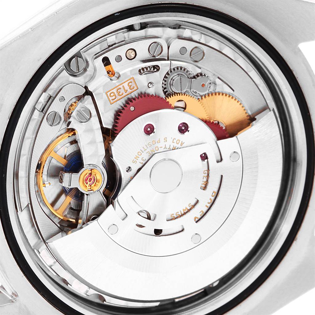 This image shows the Rolex Datejust 41 116300 Men's Stainless Steel Blue Dial 116300 Men's Stainless Steel Blue Dial watch's movement from the back, displaying gears and internal mechanisms.