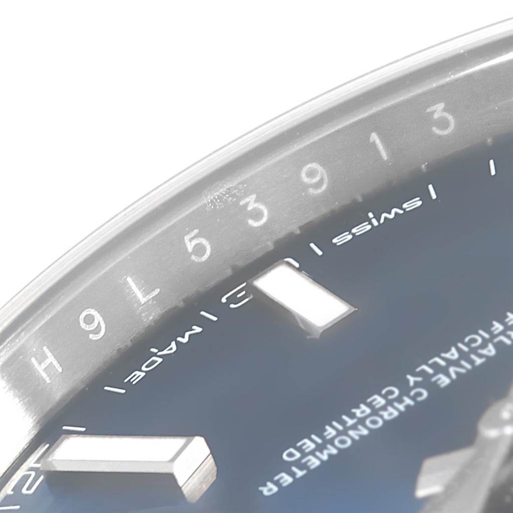 This close-up angle of the Rolex Datejust 41 126300 Men's Stainless Steel Blue Dial 126300 Men's Stainless Steel Blue Dial watch displays the dial, index markers, and part of the chapter ring.
