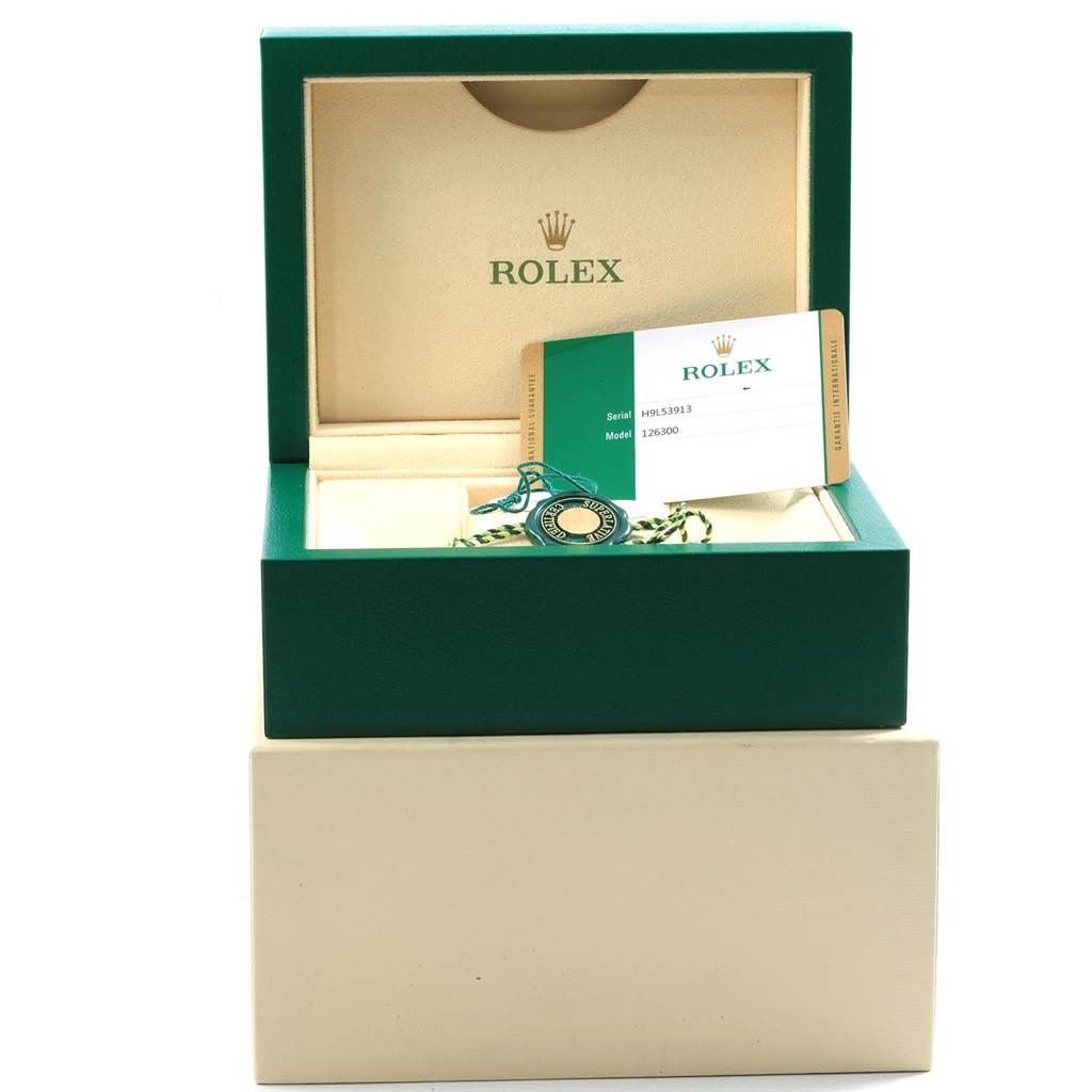 The image shows a Rolex Datejust 41 126300 Men's Stainless Steel Blue Dial 126300 Men's Stainless Steel Blue Dial model box with the warranty card and tag inside.