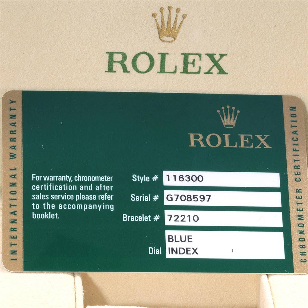 The image shows the warranty card for the Rolex Datejust 41 116300 Men's Stainless Steel Blue Dial 116300 Men's Stainless Steel Blue Dial model, including style, serial, and bracelet numbers, placed inside a box.