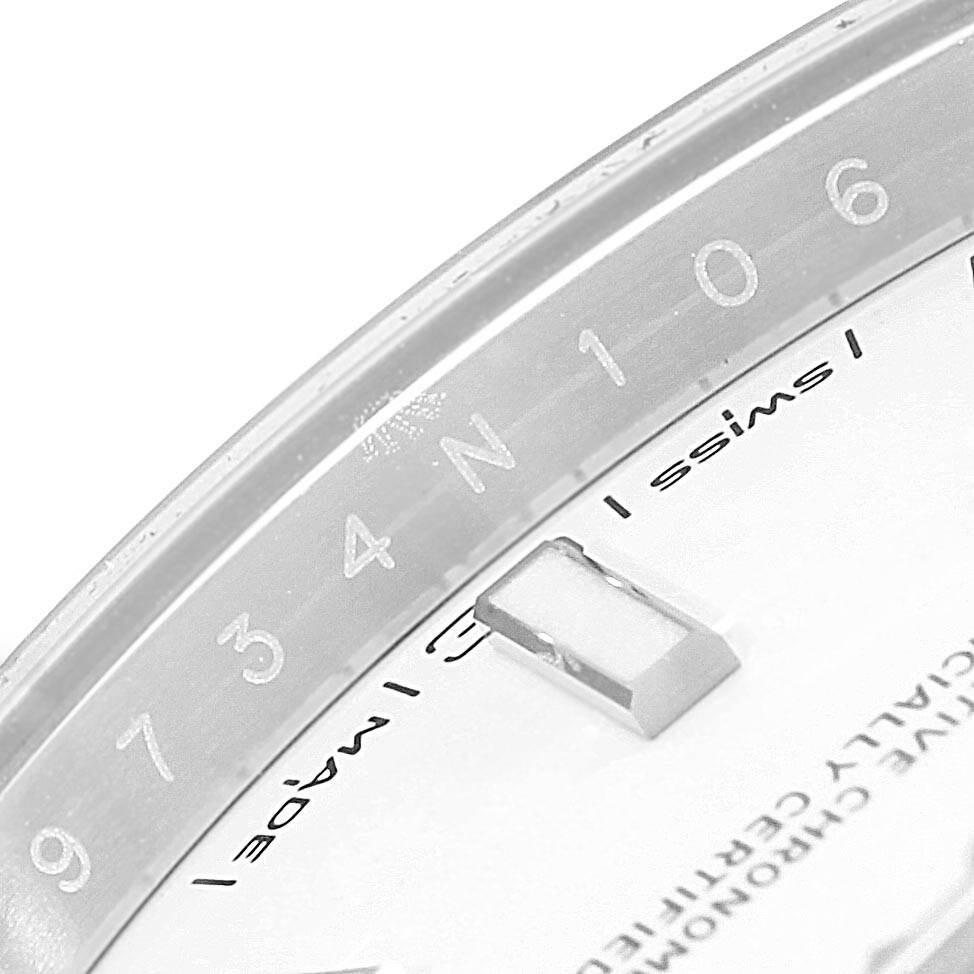 The image shows a close-up angle of a portion of the dial and rehaut of a Rolex Datejust 41 126300 Men's Stainless Steel White Dial 126300 Men's Stainless Steel White Dial watch.