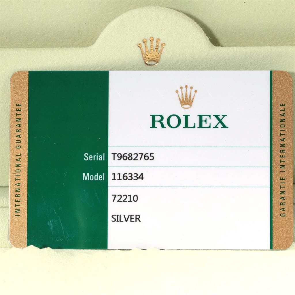 This image shows the certification card for the Rolex Datejust 41 116334 Men's Stainless Steel Silver Dial 116334 Men's Stainless Steel Silver Dial model, displaying details such as serial and model numbers in a top-down view.