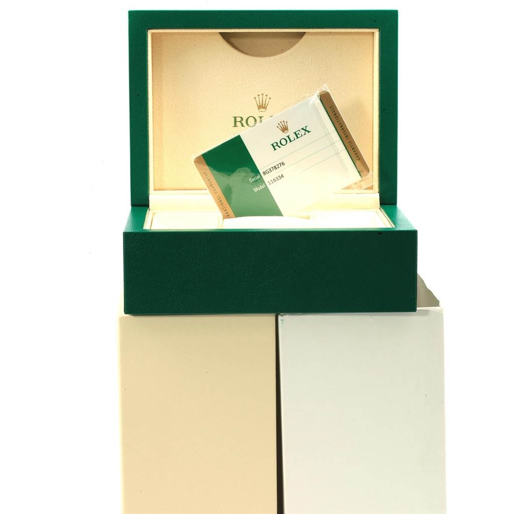 The image shows a Datejust 41 model by Rolex from a front angle, highlighting its green watch box and warranty card.