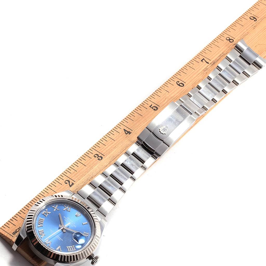 The image shows a Rolex Datejust 41 116334 Men's Stainless Steel Blue Dial 116334 Men's Stainless Steel Blue Dial watch laid flat, with the face, band, clasp, and a ruler for size reference.