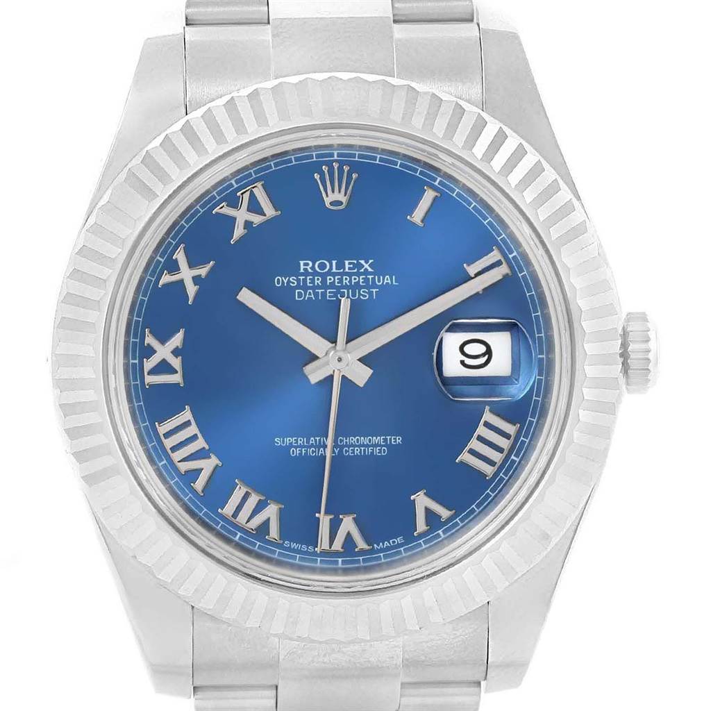 This is a close-up view of a Rolex Datejust 41 116334 Men's Stainless Steel Blue Dial 116334 Men's Stainless Steel Blue Dial watch, showing the blue dial, Roman numerals, fluted bezel, and date window.