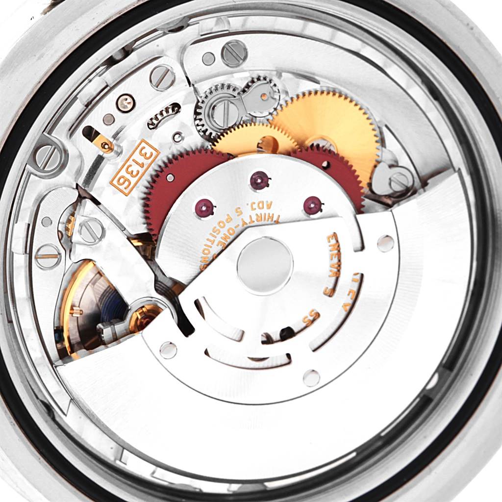 Close-up of the Rolex Datejust 41 116334 Men's Stainless Steel Blue Dial 116334 Men's Stainless Steel Blue Dial movement, showcasing gears and components from the back.