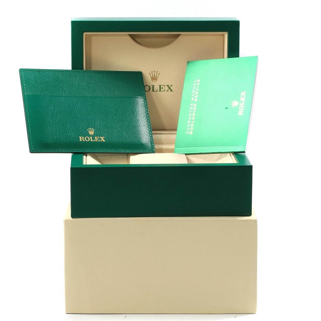 The image shows the Rolex Datejust 41 116300 Men's Stainless Steel Silver Dial 116300 Men's Stainless Steel Silver Dial packaging including a green box, a green card holder, and a booklet.