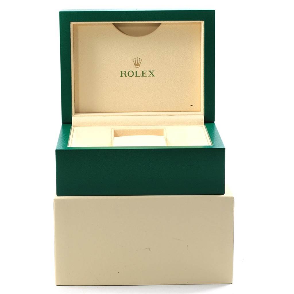 This image shows an open green and beige Rolex box, designed for the Datejust 41 model watch.