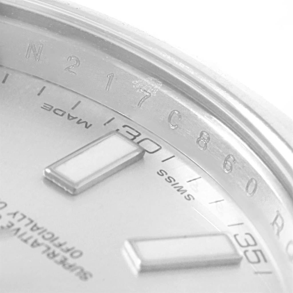 The image shows a close-up of the dial and part of the rehaut with engravings on a Rolex Datejust 41 116300 Men's Stainless Steel Silver Dial 116300 Men's Stainless Steel Silver Dial watch.