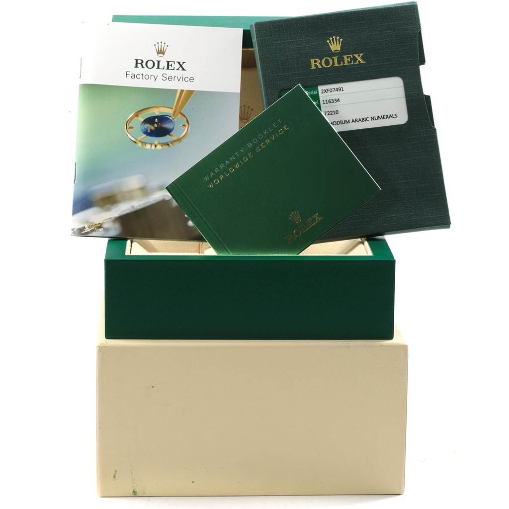 The image shows the packaging and accessories for a Rolex Datejust 41 116334 Men's Stainless Steel Grey Dial 116334 Men's Stainless Steel Grey Dial, including manuals and a warranty booklet.