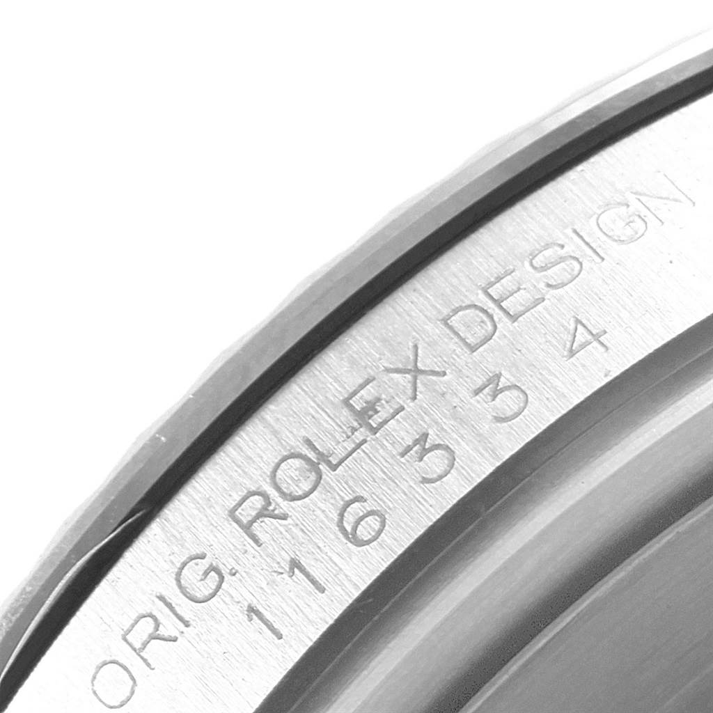 This image shows a close-up of the case engraving on a Rolex Datejust 41 116334 Men's Stainless Steel Grey Dial 116334 Men's Stainless Steel Grey Dial model.