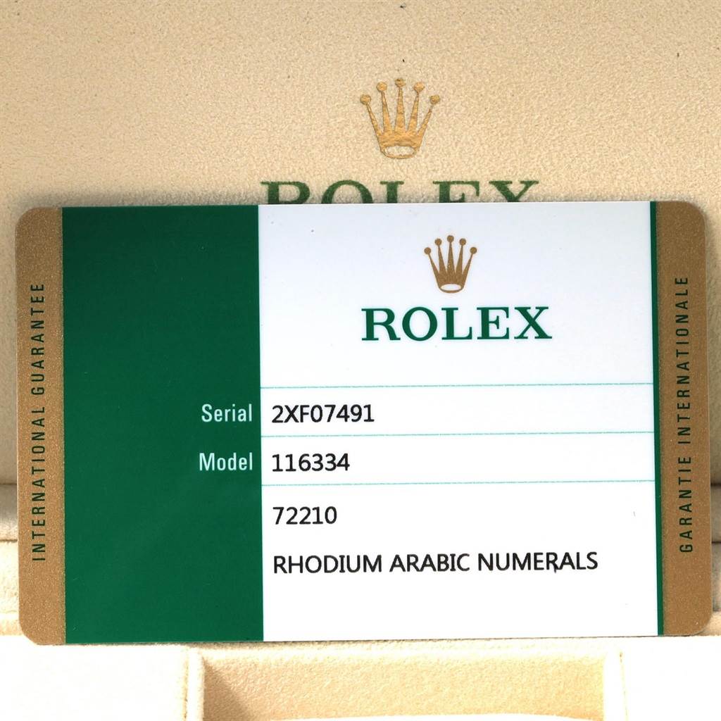 The image shows the international guarantee card for the Rolex Datejust 41 116334 Men's Stainless Steel Grey Dial 116334 Men's Stainless Steel Grey Dial model, detailing the serial number and model information.