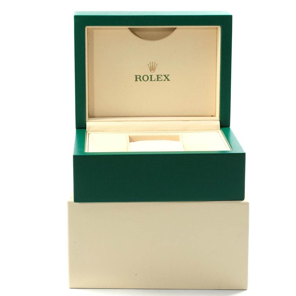 This image shows the open green presentation box for a Rolex Datejust 41 126300 Men's Stainless Steel Black Dial 126300 Men's Stainless Steel Black Dial watch, displaying the brand's logo inside.