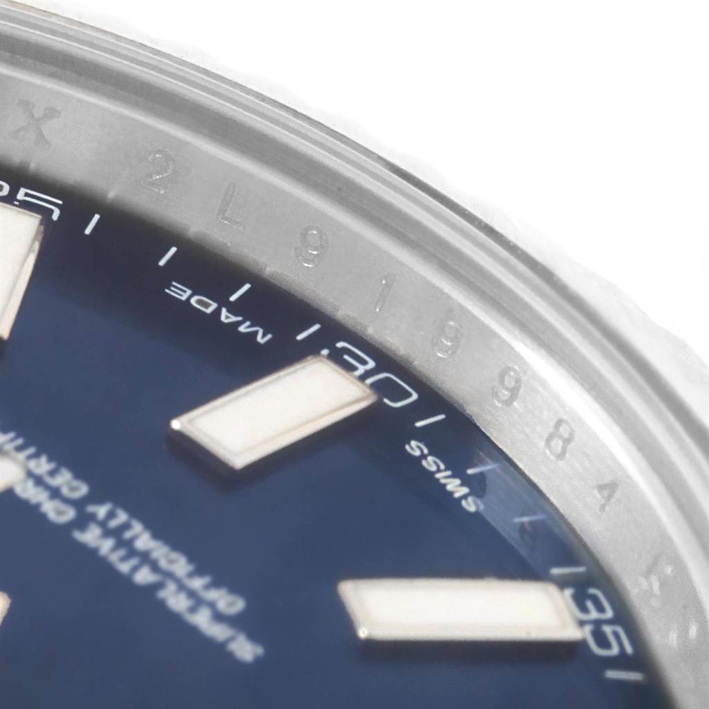 The image shows a close-up of the dial, bezel, and part of the blue face of the Rolex Datejust 41 116334 Men's Stainless Steel Blue Dial 116334 Men's Stainless Steel Blue Dial watch.