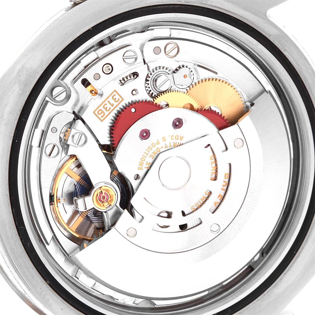 This image shows the internal mechanism and intricate components of a Rolex Datejust 41 116334 Men
s Stainless Steel Grey Dial 116334 Men
s Stainless Steel Grey Dial model watch from a close-up, top-down angle.
