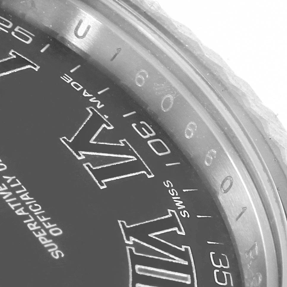 The image shows a close-up of the dial and bezel of a Rolex Datejust 41 116334 Men
s Stainless Steel Grey Dial 116334 Men
s Stainless Steel Grey Dial watch, highlighting the Roman numerals and minute markers.