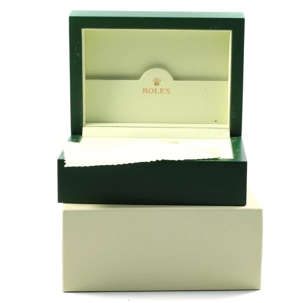 The image shows an open Rolex Datejust 41 116334 Men's Stainless Steel Blue Dial 116334 Men's Stainless Steel Blue Dial box, featuring the inner lining and the logo inside.