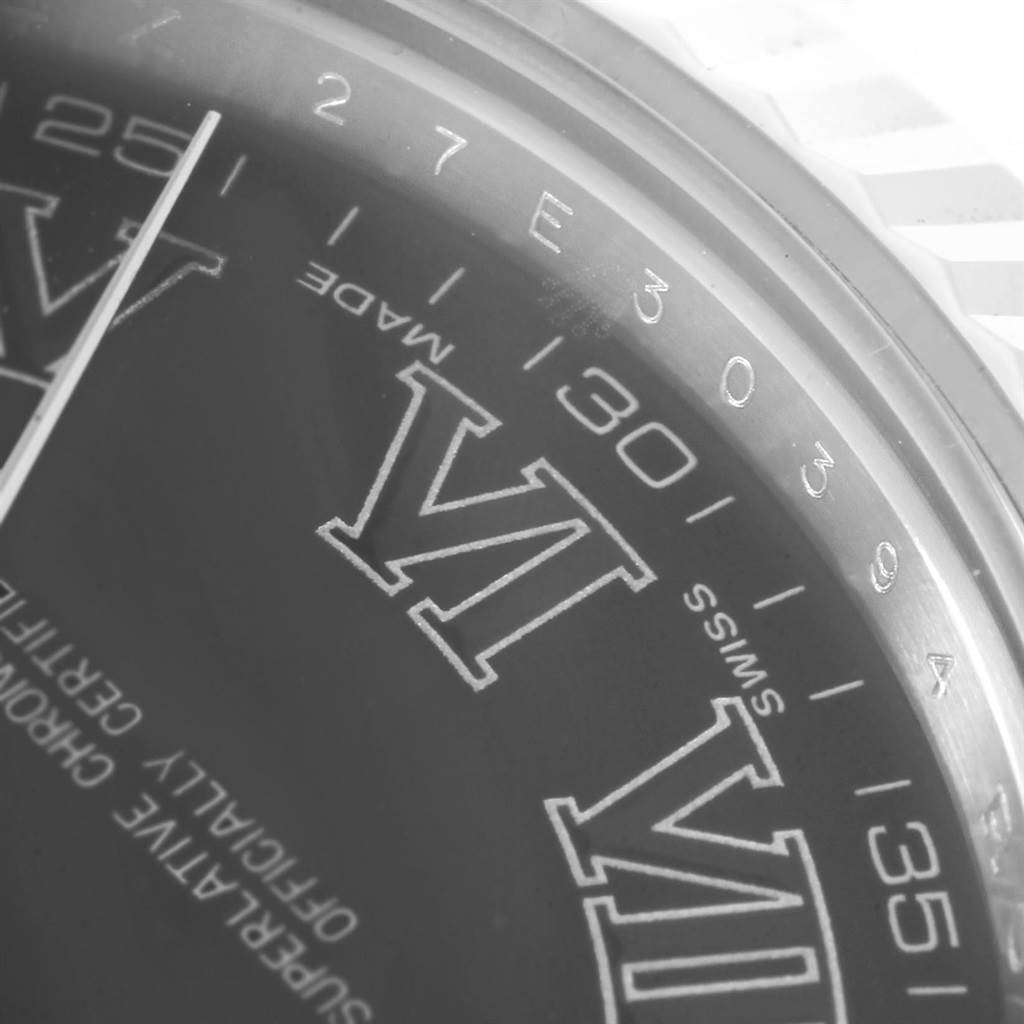 The image shows a close-up of the dial and bezel of a Rolex Datejust 41 116334 Men's Stainless Steel Grey Dial 116334 Men's Stainless Steel Grey Dial, highlighting the Roman numerals and minute markers.