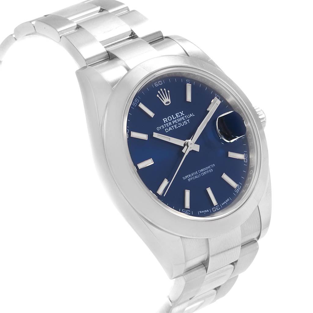 This image shows a Rolex Datejust 41 126300 Men's Stainless Steel Blue Dial 126300 Men's Stainless Steel Blue Dial watch at a three-quarter angle, featuring its blue dial, bracelet, and date window with cyclops lens.