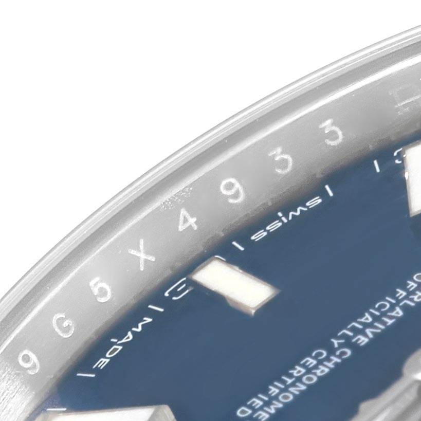 The image shows a close-up of the upper-right dial and part of the bezel of a Rolex Datejust 41 126300 Men's Stainless Steel Blue Dial 126300 Men's Stainless Steel Blue Dial watch.