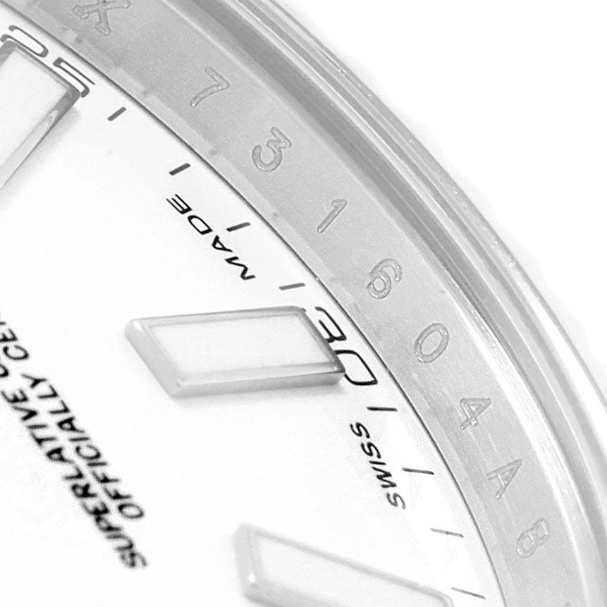 This close-up image shows the dial and partial bezel of the Rolex Datejust 41 116334 Men's Stainless Steel White Dial 116334 Men's Stainless Steel White Dial, highlighting the date markers and hour indices.