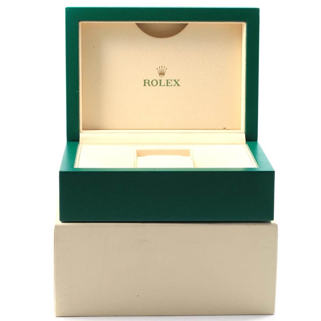 The image shows an open Rolex Datejust 41 116334 Men's Stainless Steel White Dial 116334 Men's Stainless Steel White Dial watch box with a green exterior and beige interior.