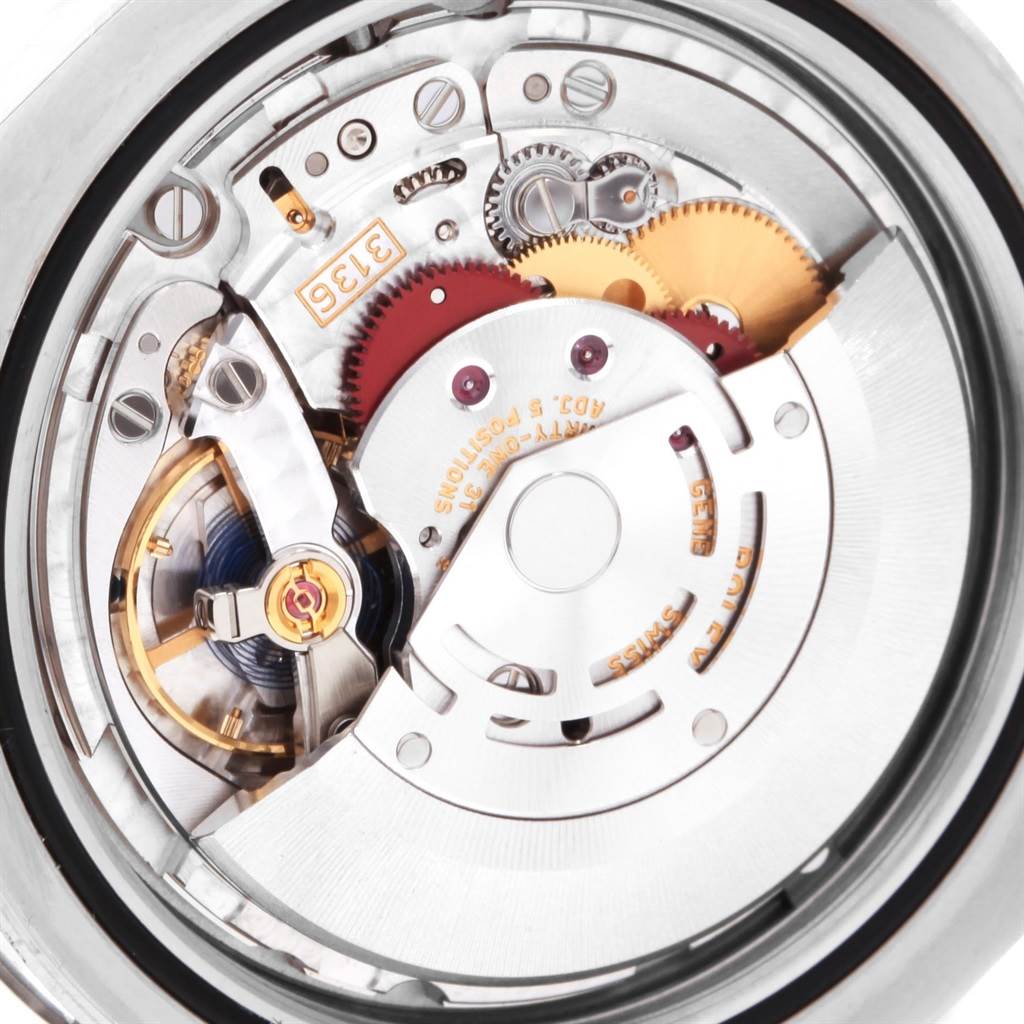 This close-up image displays the intricate inner mechanism of the Rolex Datejust 41 116300 Men's Stainless Steel Blue Dial 116300 Men's Stainless Steel Blue Dial watch.
