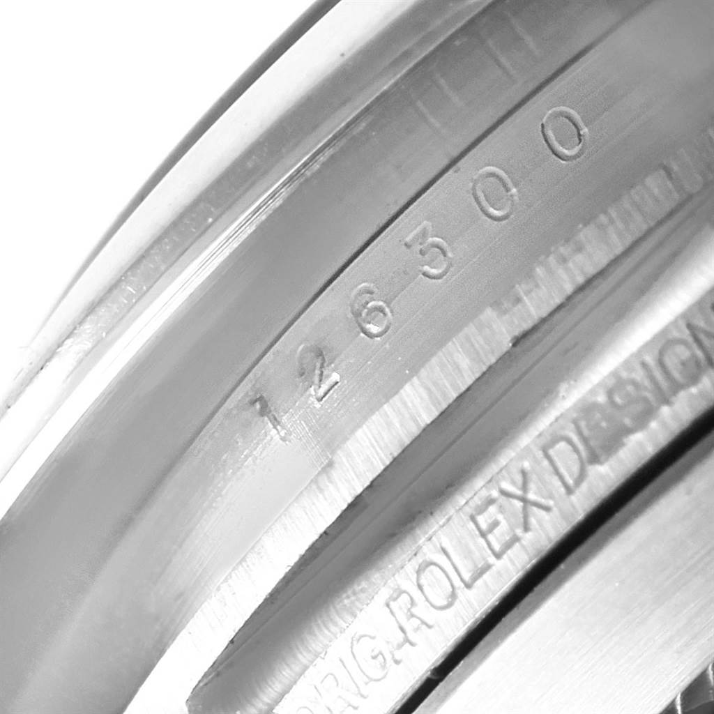 This close-up angle displays the engraved model number and design details on the Rolex Datejust 41 126300 Men's Stainless Steel Grey Dial 126300 Men's Stainless Steel Grey Dial's metal casing.