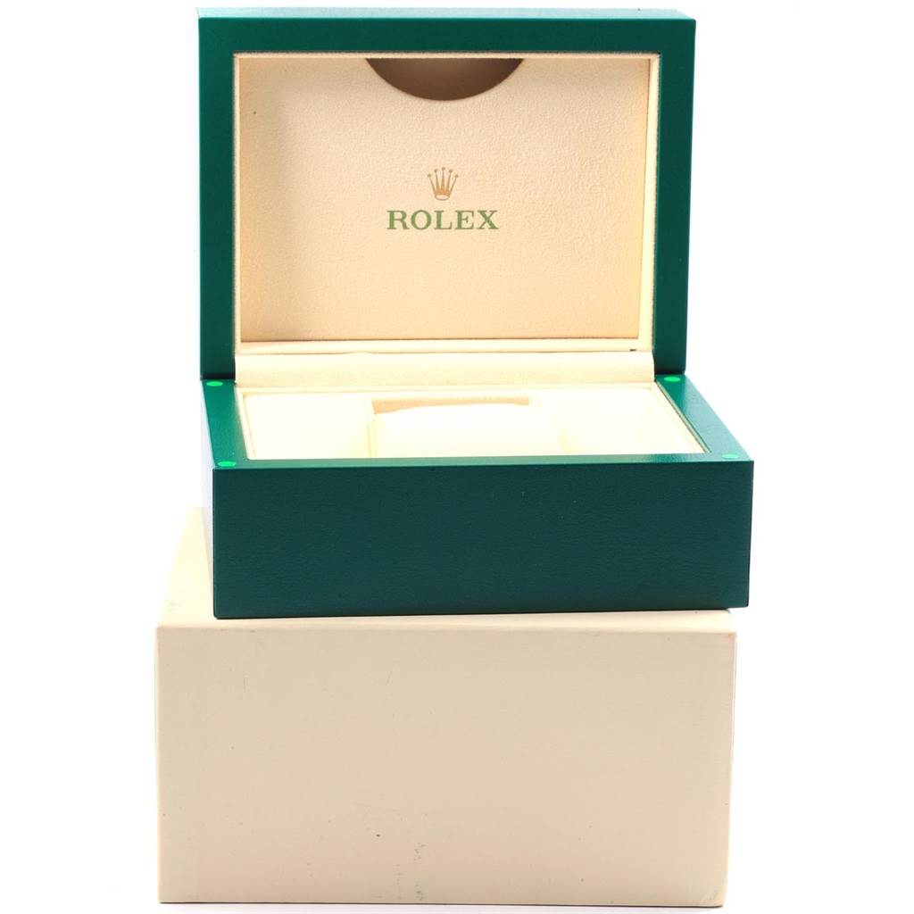The image shows the open green and beige box for the Rolex Datejust 41 116300 Men
s Stainless Steel Blue Dial 116300 Men
s Stainless Steel Blue Dial model, highlighting the brand
s logo inside.