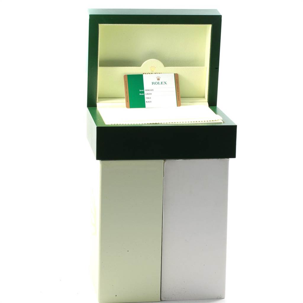 This image shows a Rolex Datejust 41 126333 Men's Steel and Gold (two tone) Black Dial 126333 Men's Steel and Gold (two tone) Black Dial watch box open, displaying the warranty card.