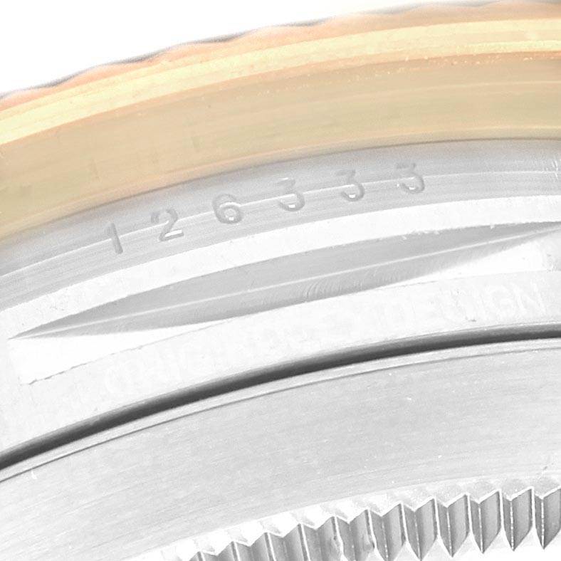 The image shows a close-up of the model number engraved on the edge of the Rolex Datejust 41 126333 Men's Steel and Gold (two tone) Black Dial 126333 Men's Steel and Gold (two tone) Black Dial watch case.