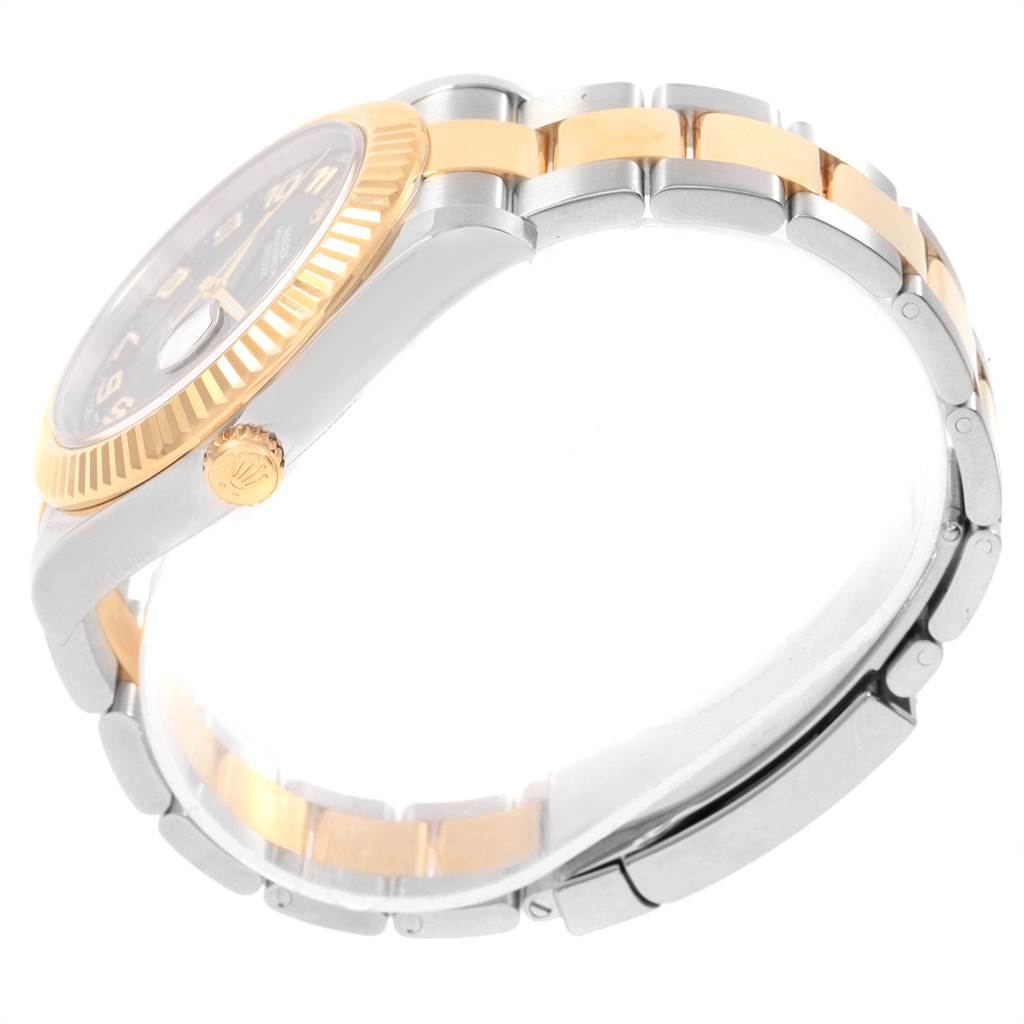 The image shows a side angle of a Rolex Datejust 41 116333 Men's Steel and Gold (two tone) Black Dial 116333 Men's Steel and Gold (two tone) Black Dial watch, focusing on the bezel, crown, and part of the bracelet.