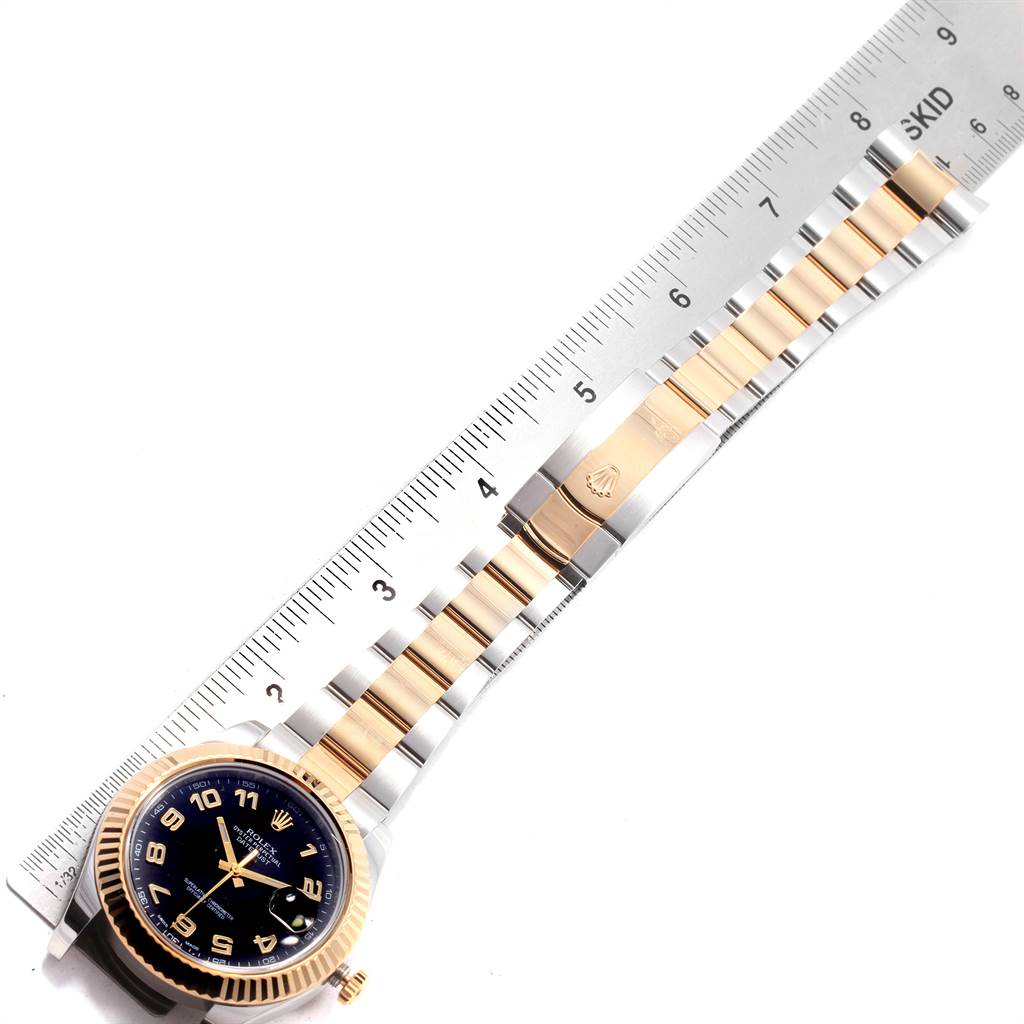 The image shows a Rolex Datejust 41 116333 Men's Steel and Gold (two tone) Black Dial 116333 Men's Steel and Gold (two tone) Black Dial watch laid flat with a ruler measuring its band length.